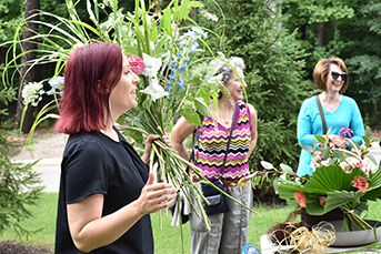 Photo of Cranbrook House and Gardens volunteers. Link to Life Stage Gift Planner Ages 45-65 Situations.