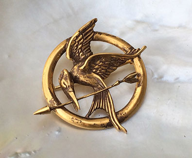  Schneider’s Mockingjay pin